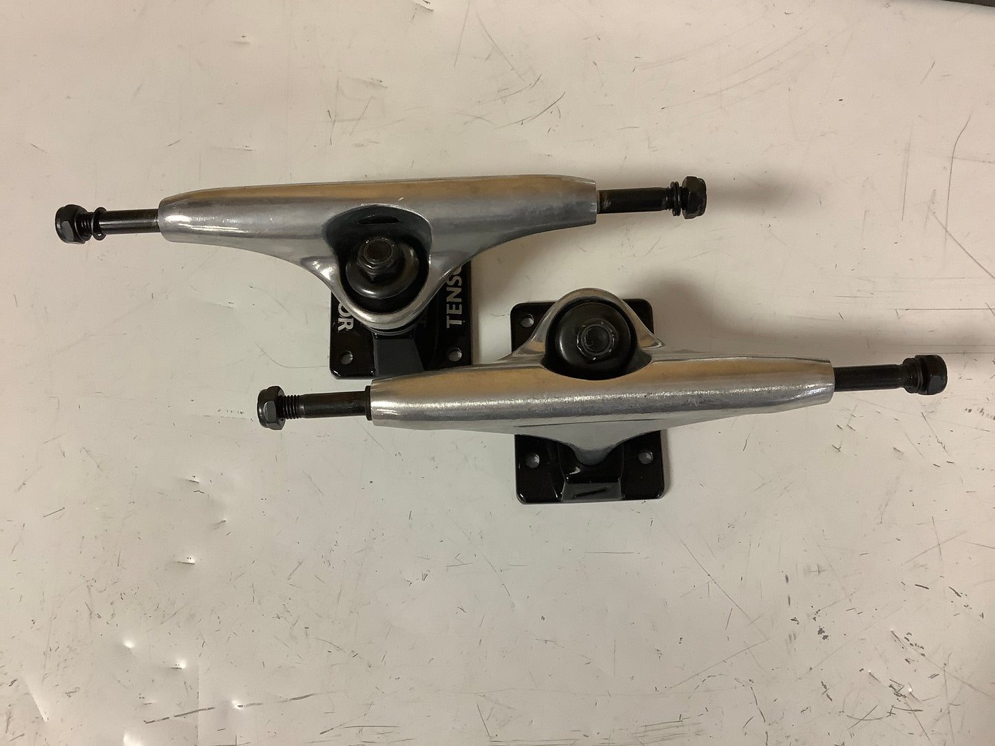 Tensor Trucks 5 3/4 Alloy silver hangers black baseplates