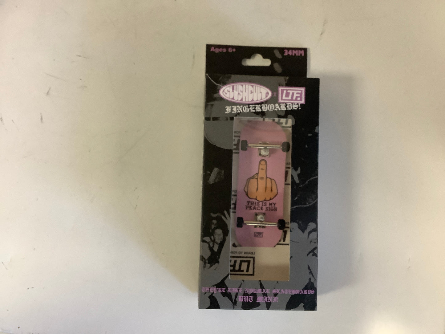 Slushcult x LTF Grom Series peace sign fingerboard