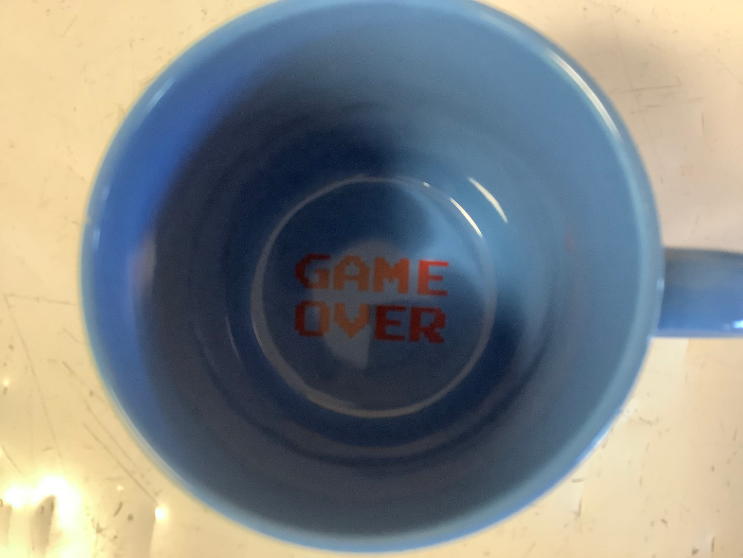 Girl skateboards PAC Man game over Mug