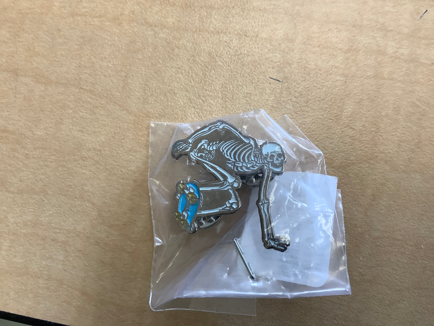 Powell Peralta lapel pin Bones skeleton