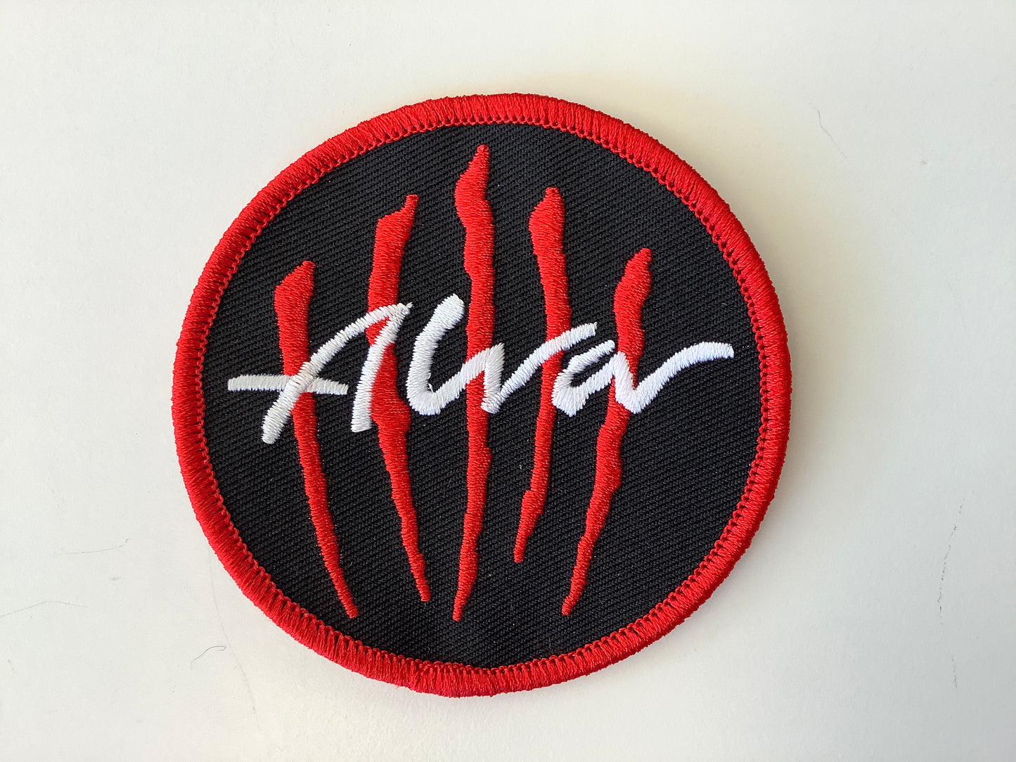 Alva Patch scratch round Black / red / white