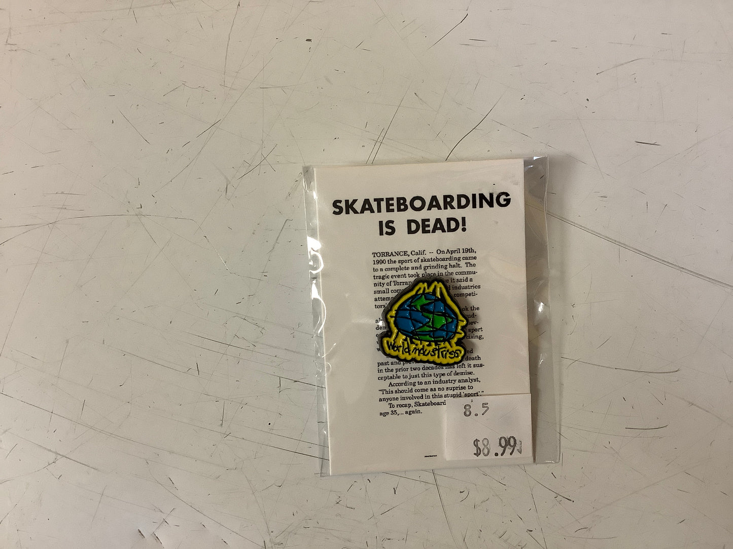 World Industries lapel pin globe