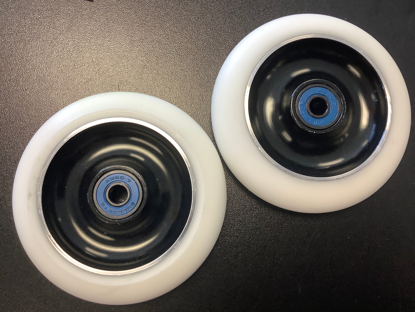 White scooter wheels black hub