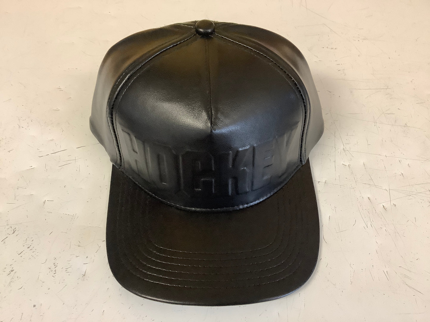 Hockey leather embossed hat
