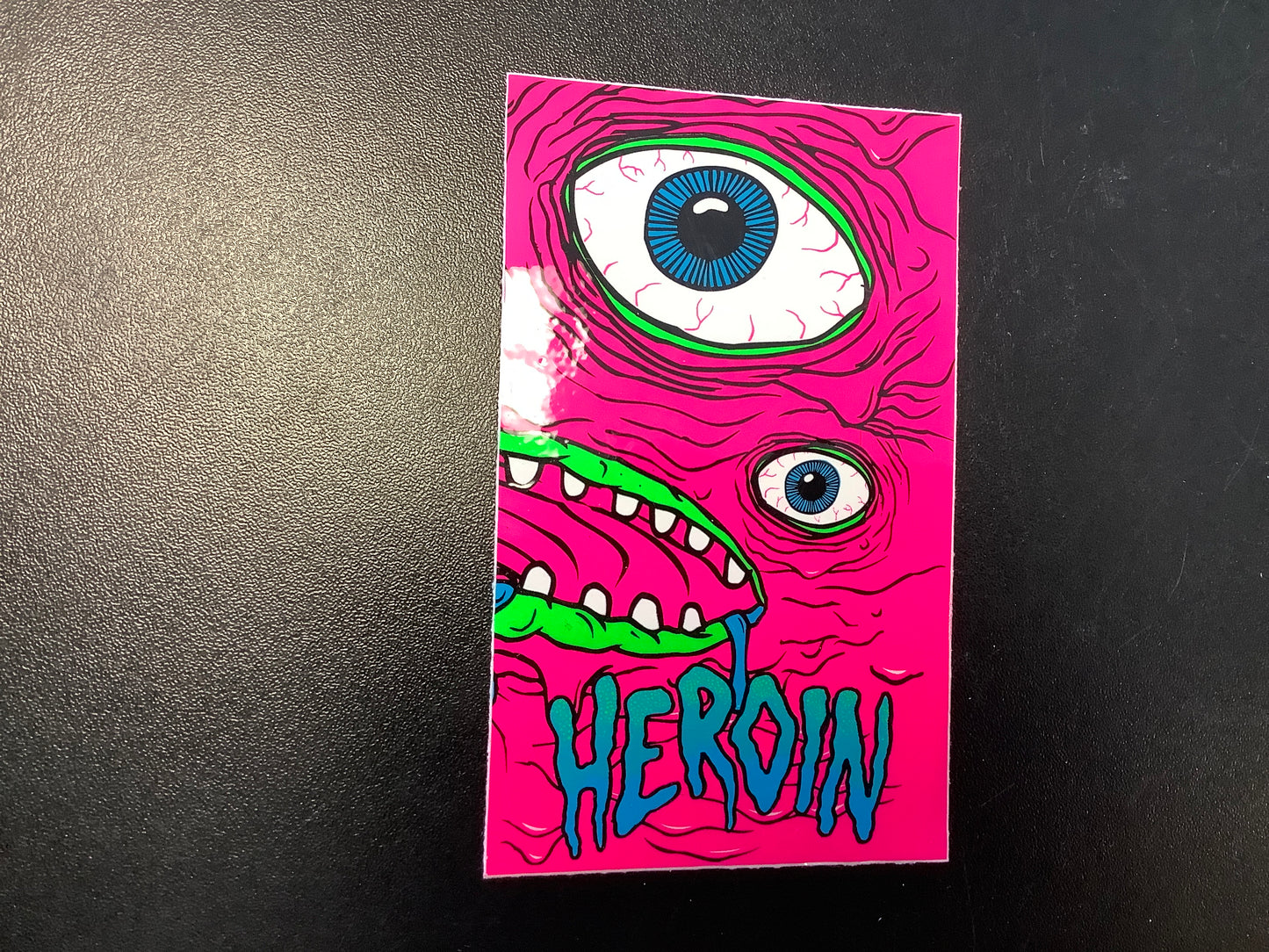 Heroin skateboards pink mush face sticker