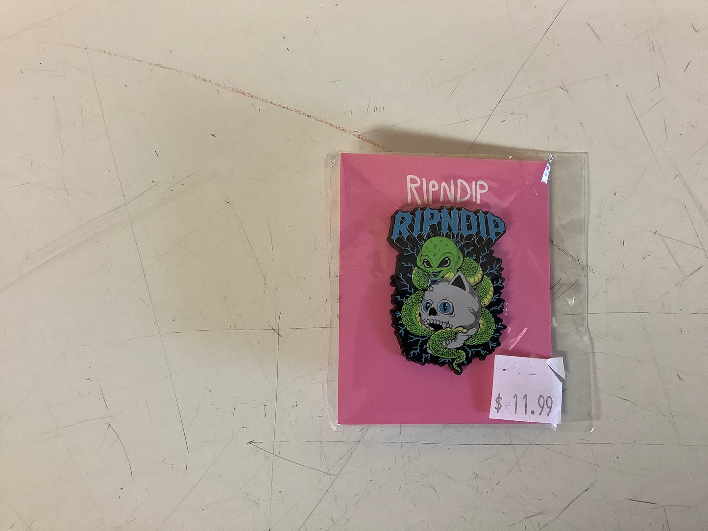 Rip n Dip lapel pin Skull and bones