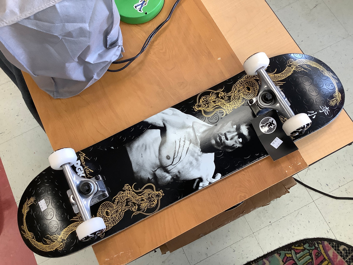 DGK X Bruce Lee balance complete skateboard embossed