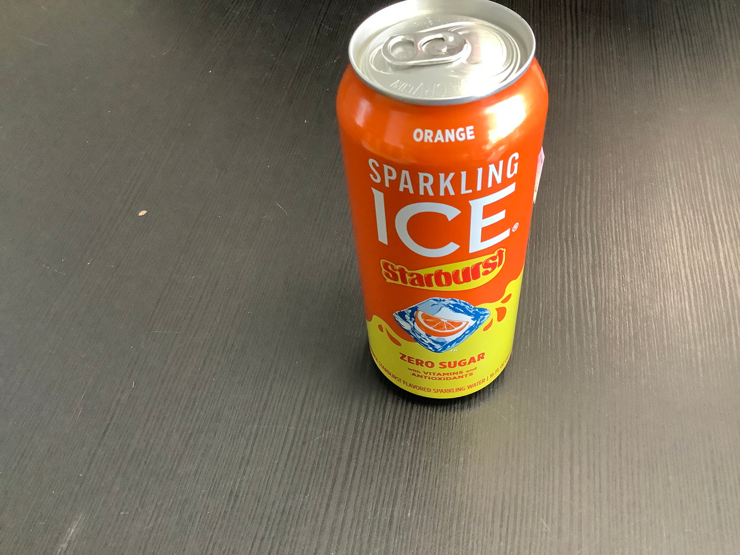 Sparkling Ice starburst orange can