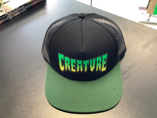Creature trucker hat green /black