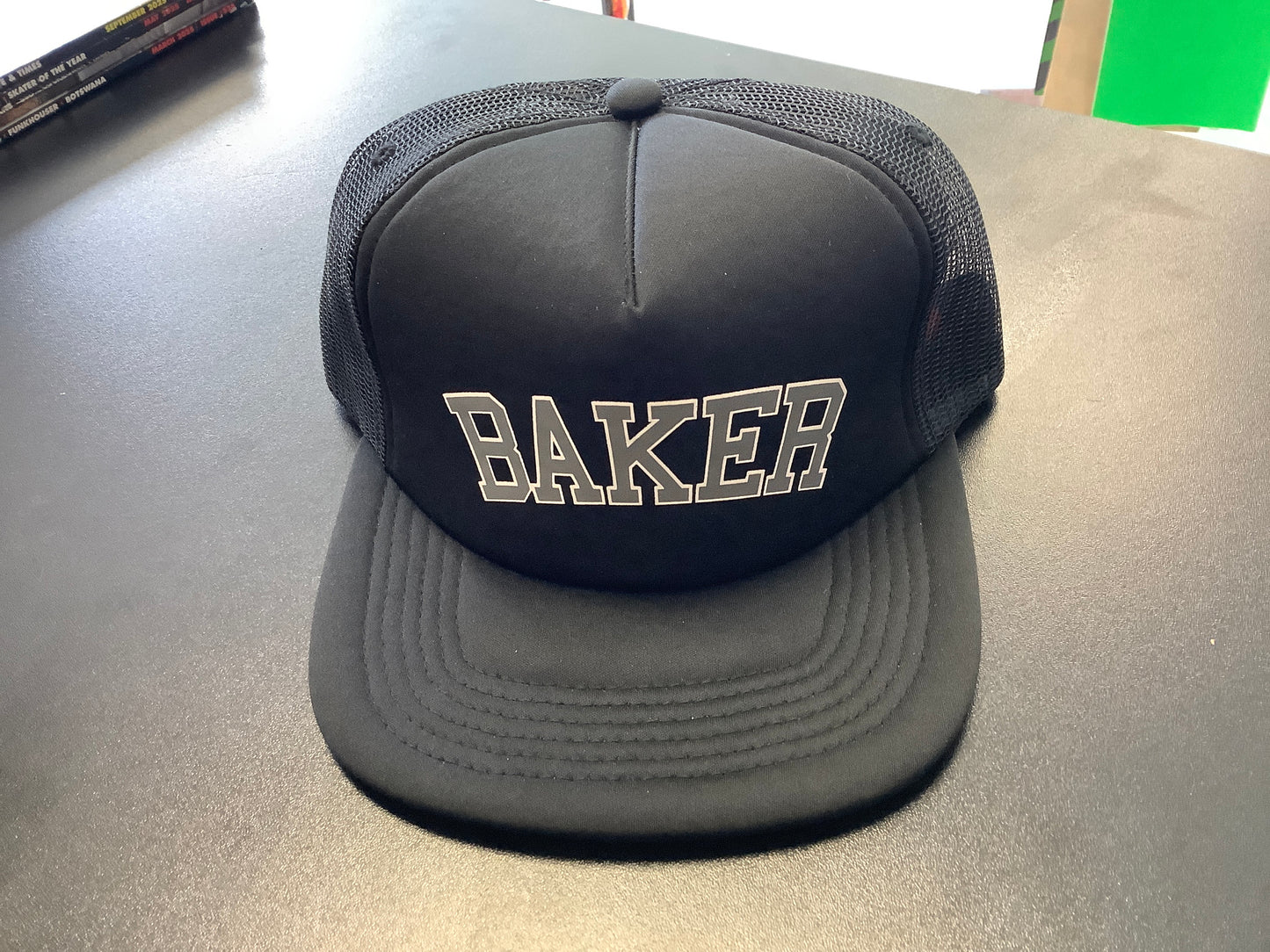 Baker Winston trucker hat gray logo