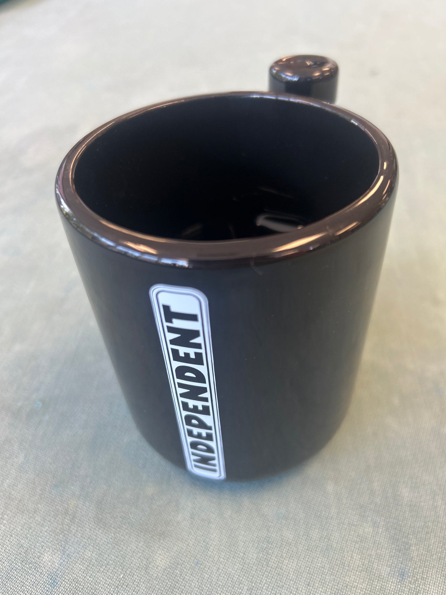 Independent Coffee Mug Black with Truck handle.
