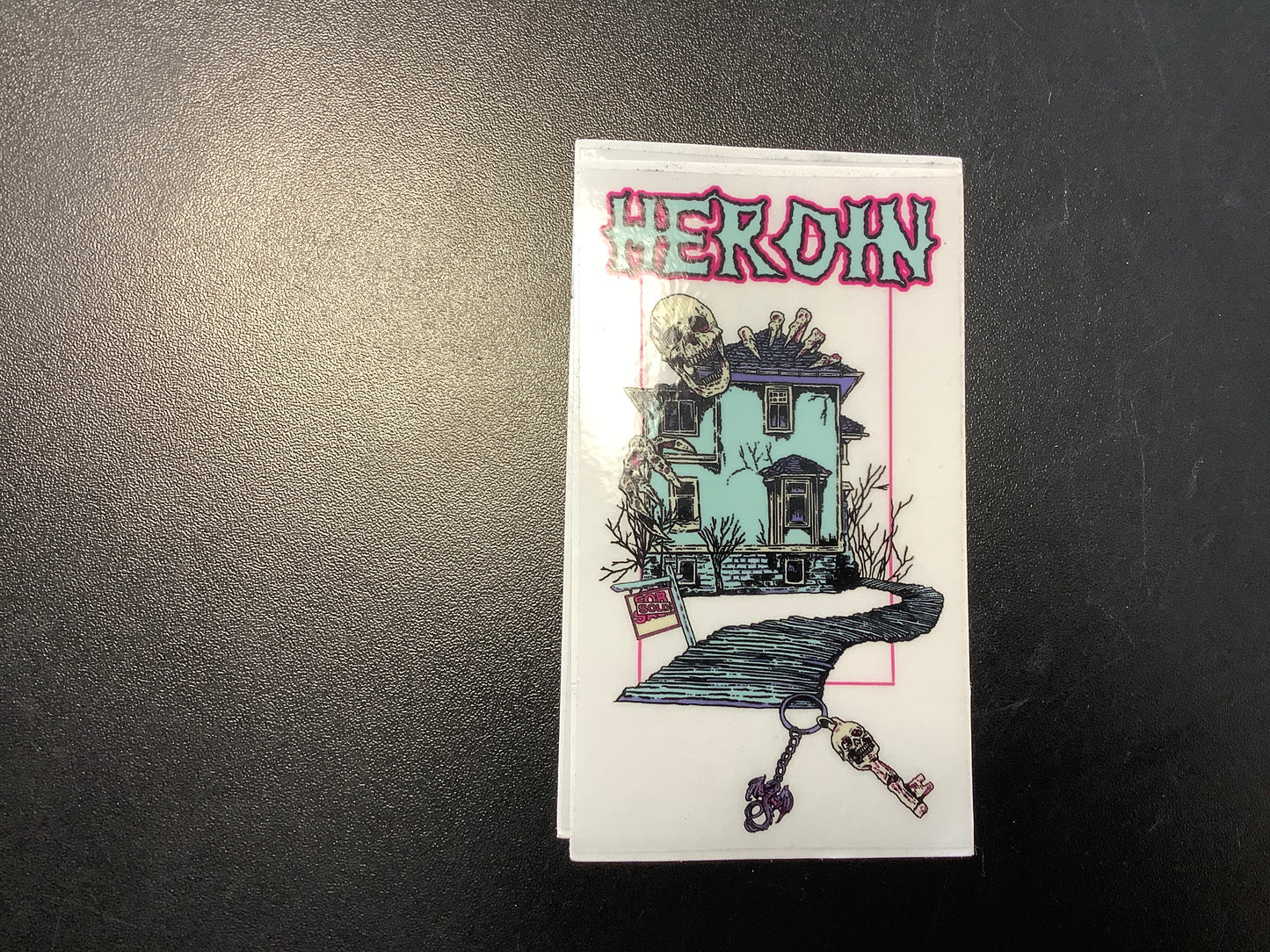 Heroin skateboards haunted house sticker