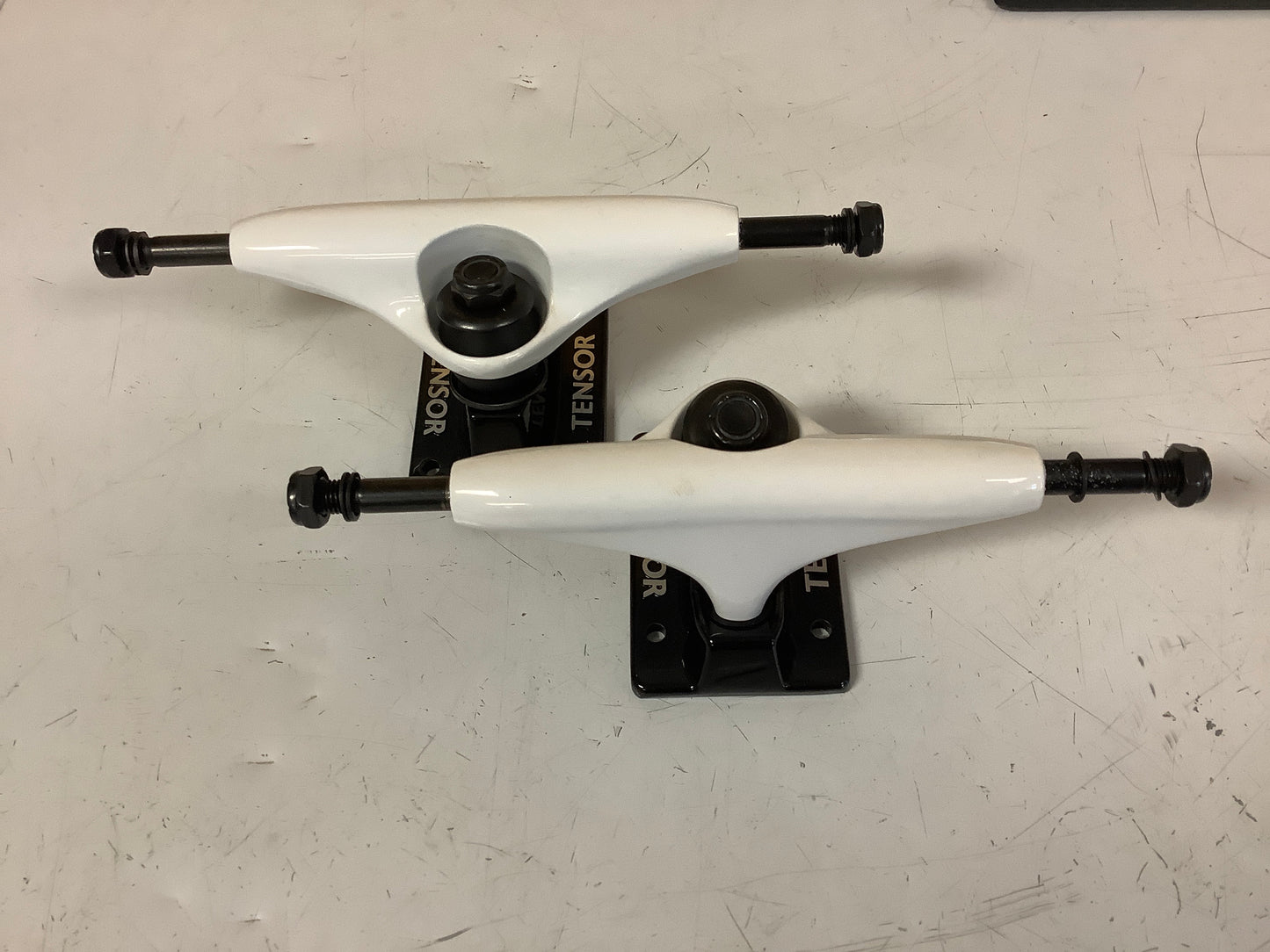 Tensor Trucks 5.0 white hangers black baseplates